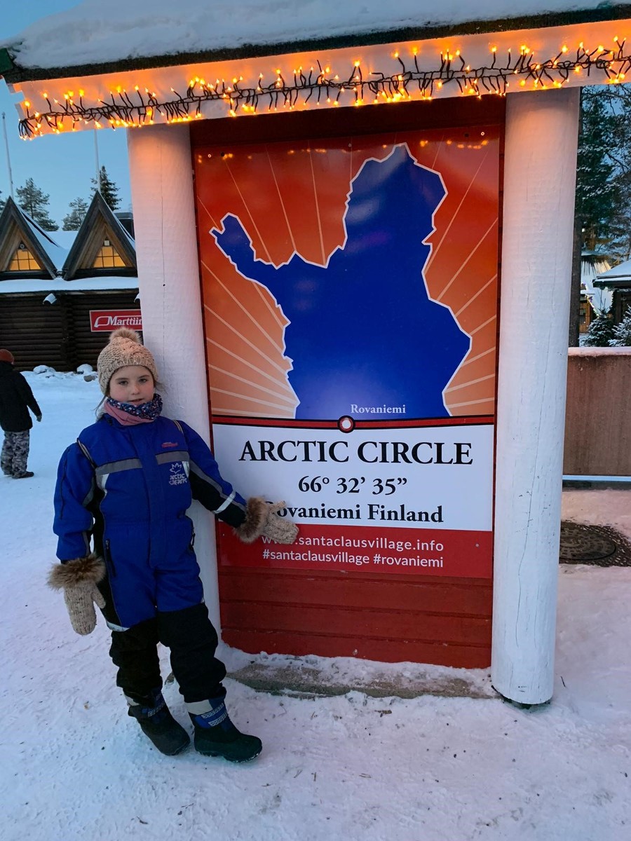 Lorraine Lapland Blog- niece with Arctic Circle sign