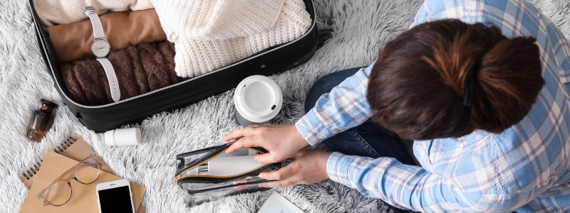 Travel Checklist- woman packing